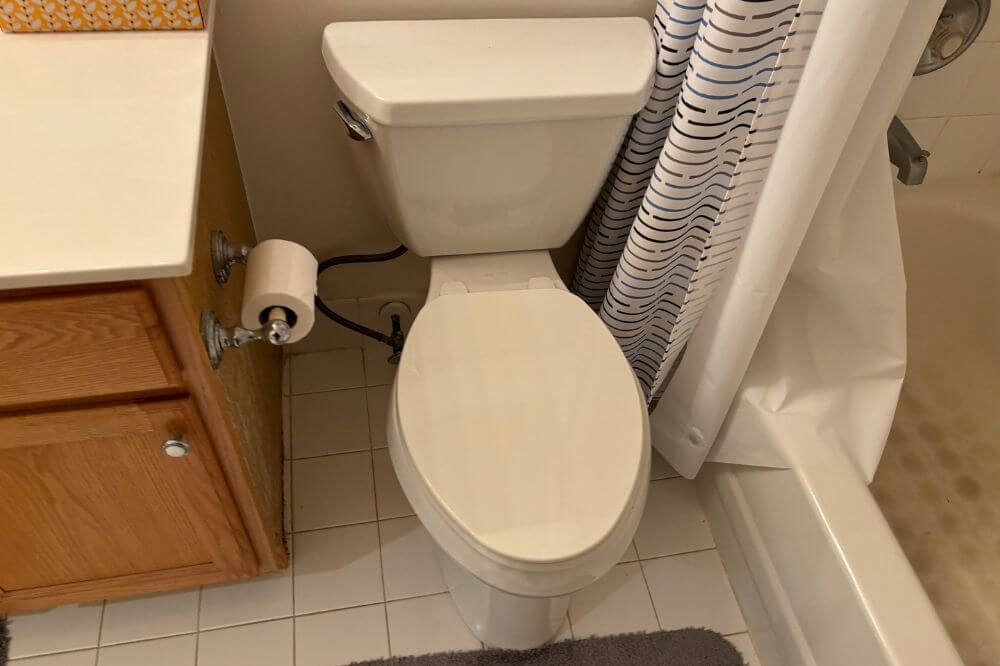 Small bathroom remodel contractors working on a modern bathroom renovation