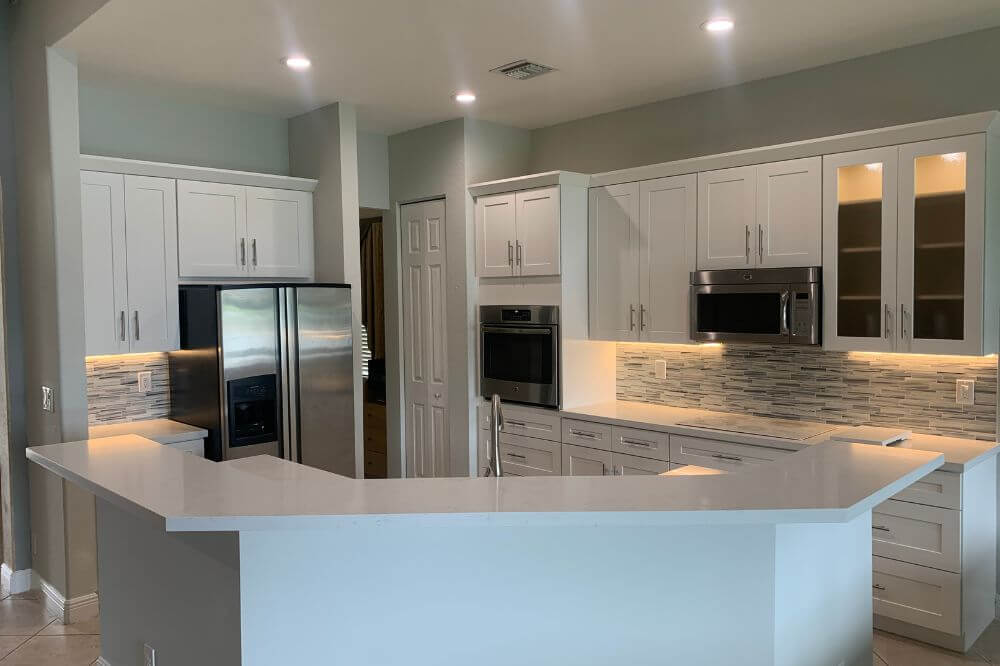 Small kitchen remodel with modern cabinets and updated design