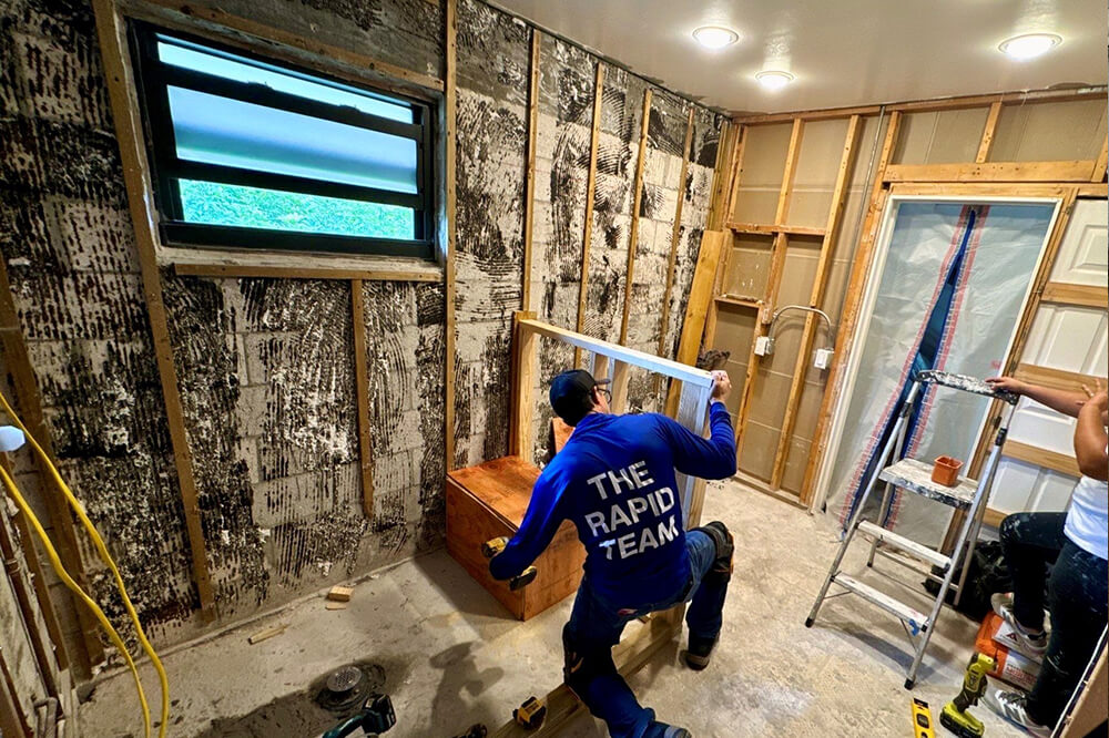 Structural remodeling contractor working on residential building renovation