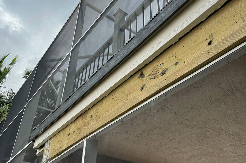 Florida roof repair company inspecting and repairing a residential roof